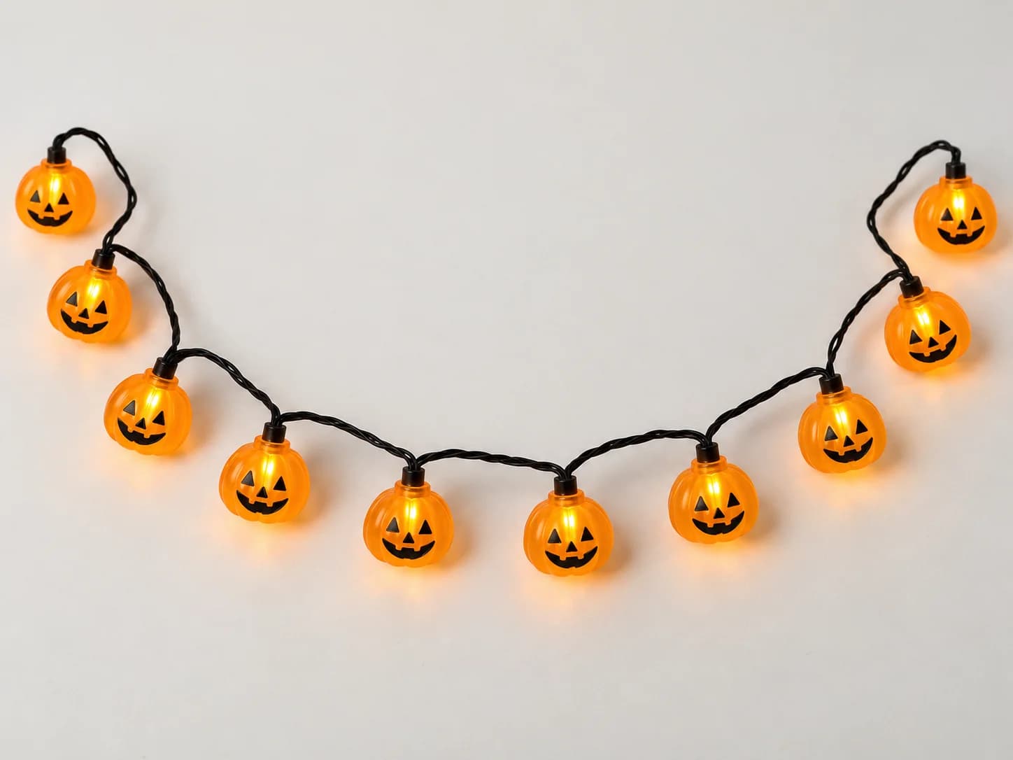 Orange pumpkin string lights used as the decoration reference
