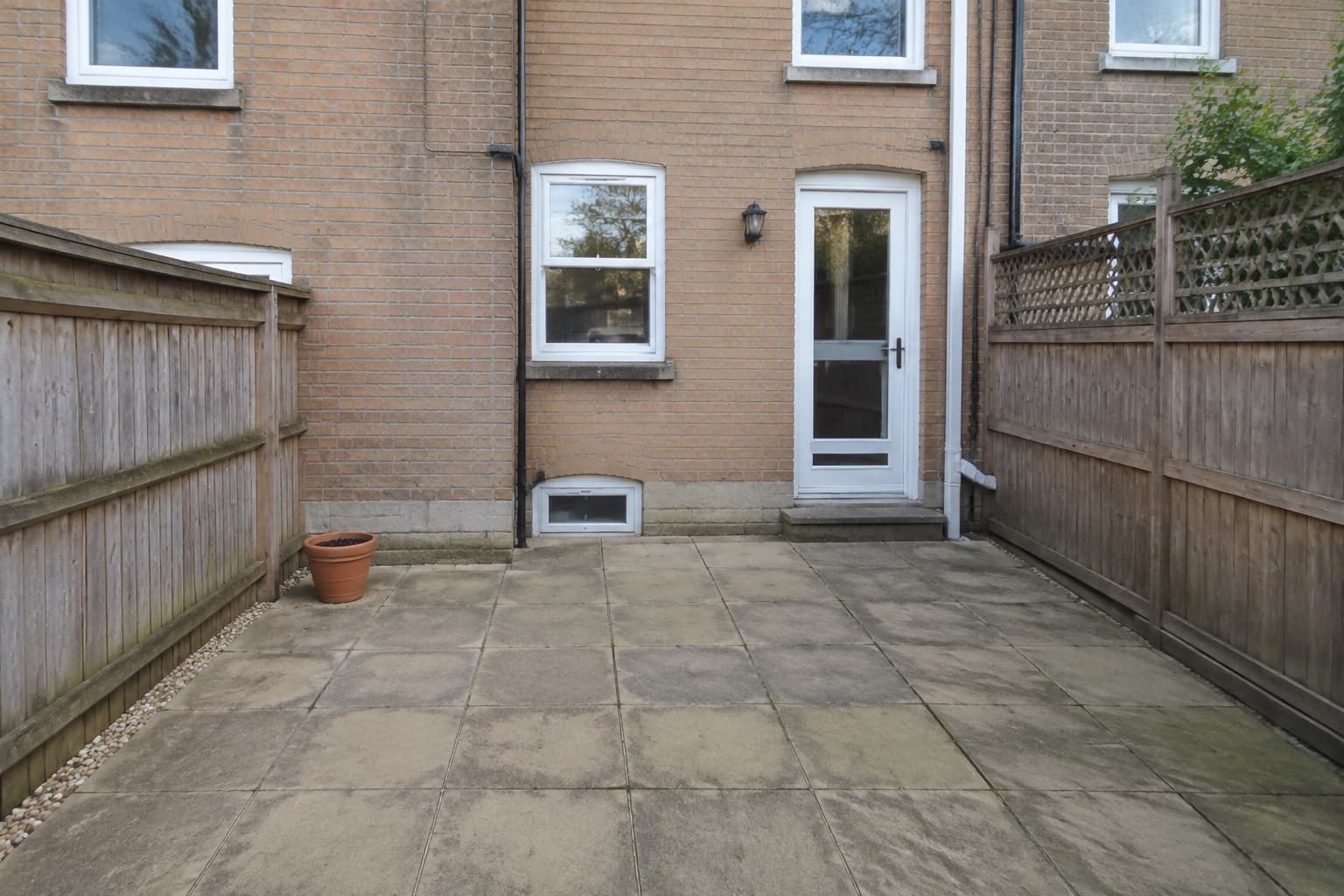 Choose a new look for landscape paths and patios: Before