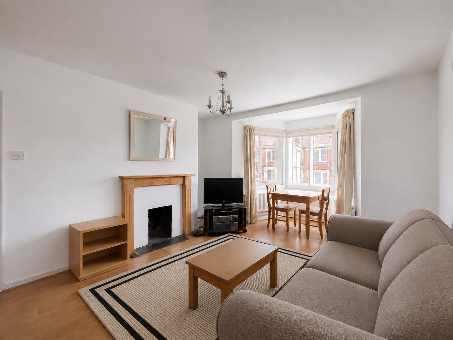 Find a living room rug that works with your furniture: After